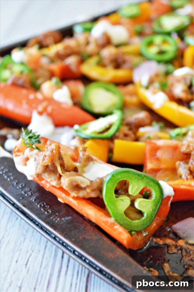 Stuffed Bell Pepper Nachos 4 Bell peppers meticulously halved and arranged on a baking sheet, ready for nacho toppings