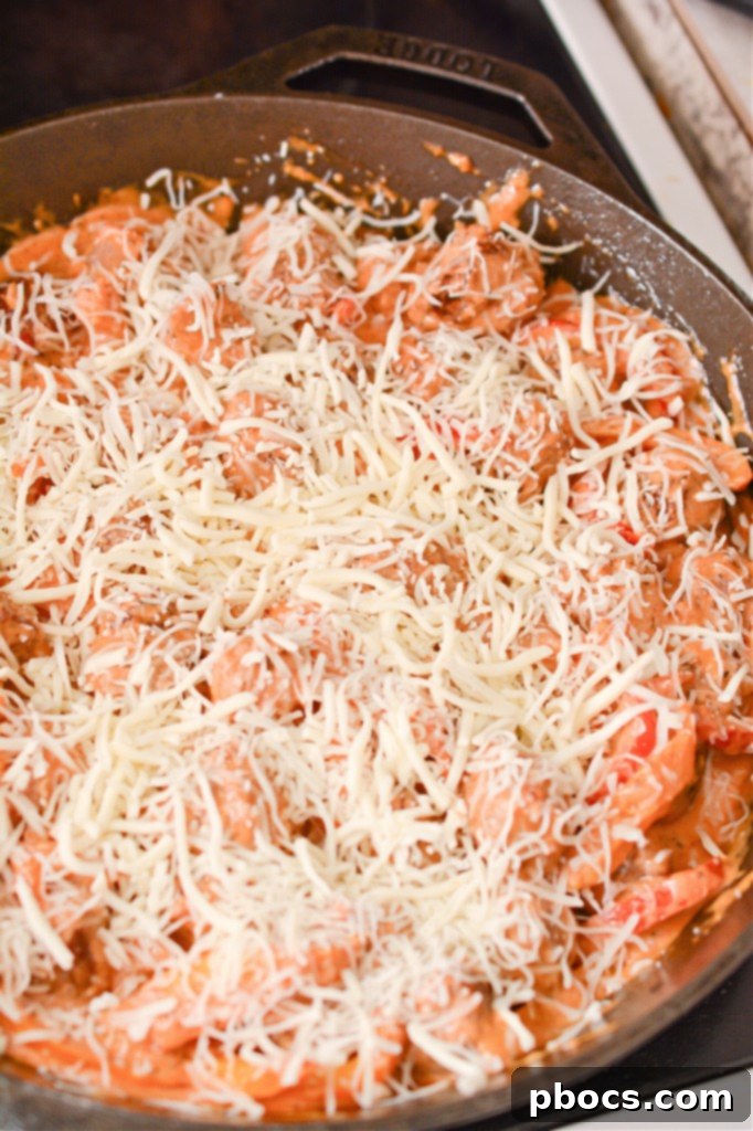 Step 6: Stir in Parmesan and Combine