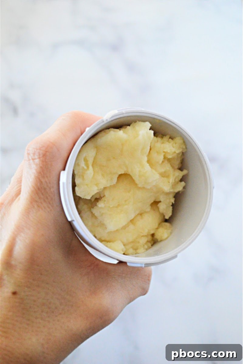 Churro dough in a piping bag