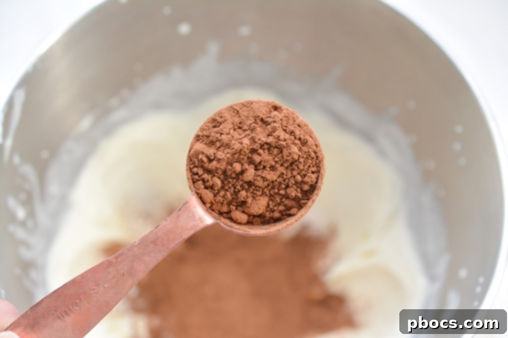 Mixing cream cheese and heavy cream