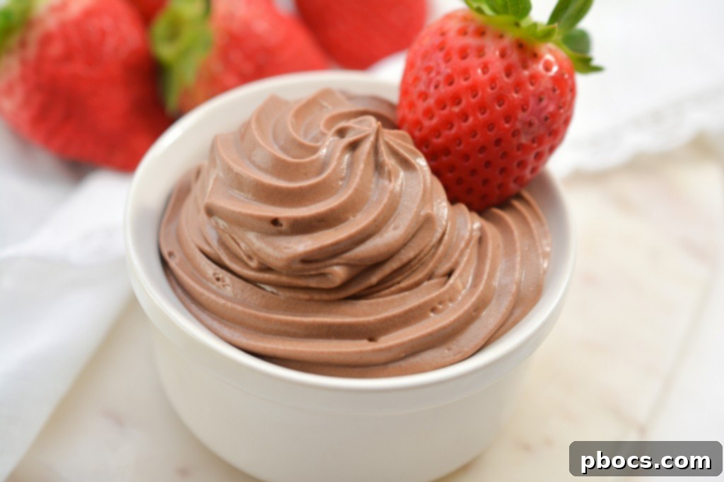 Close-up of Keto Chocolate Mousse with a spoon