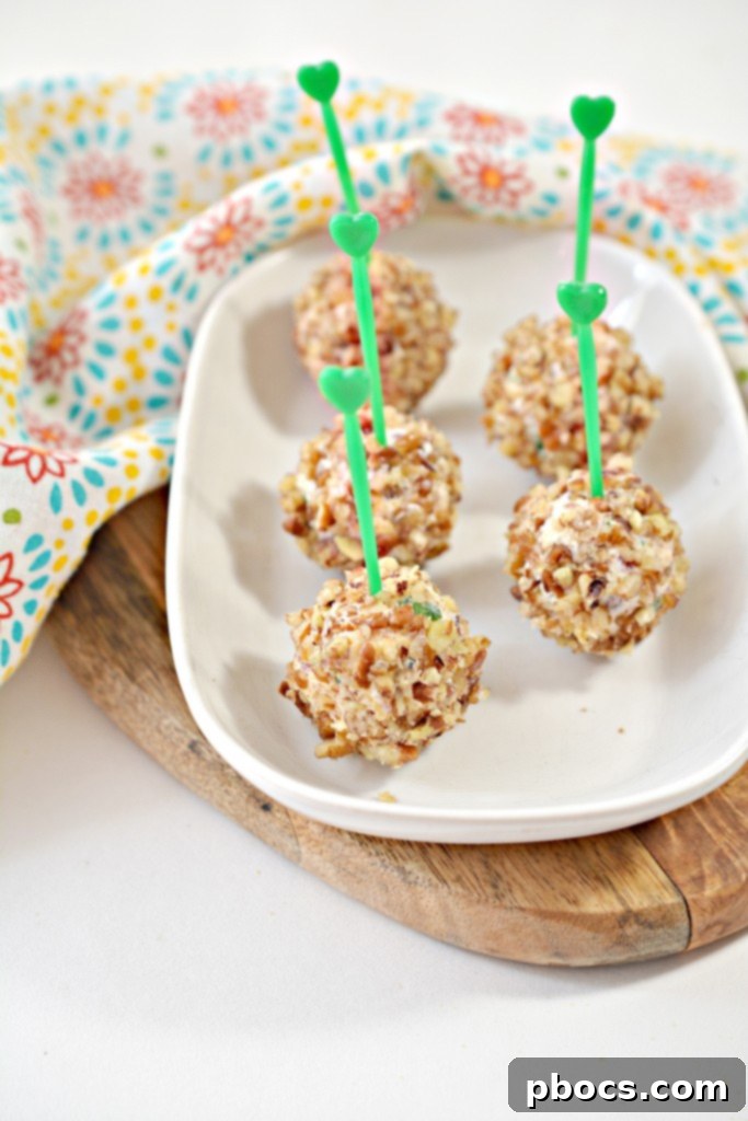 Variety of Mini Keto Cheese Balls, some with added spice or alternative nuts