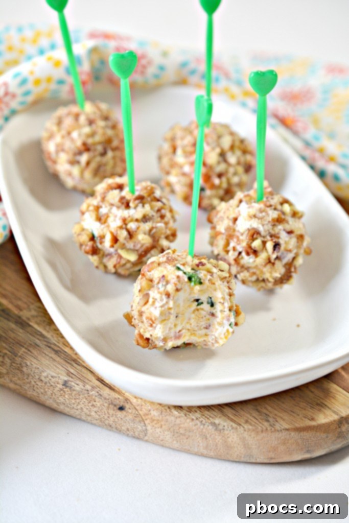 Mini Keto Cheese Balls arranged artfully on a serving dish