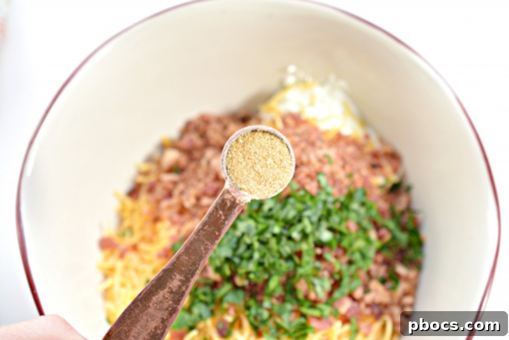 Mixing bowl with cheese ball ingredients combined