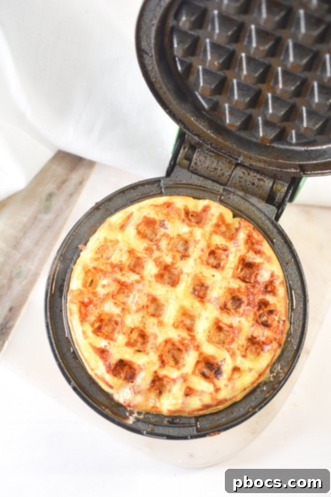 Ultimate Keto Chaffle Breakfast Sandwich 8 Mixing chaffle ingredients in a bowl until well combined