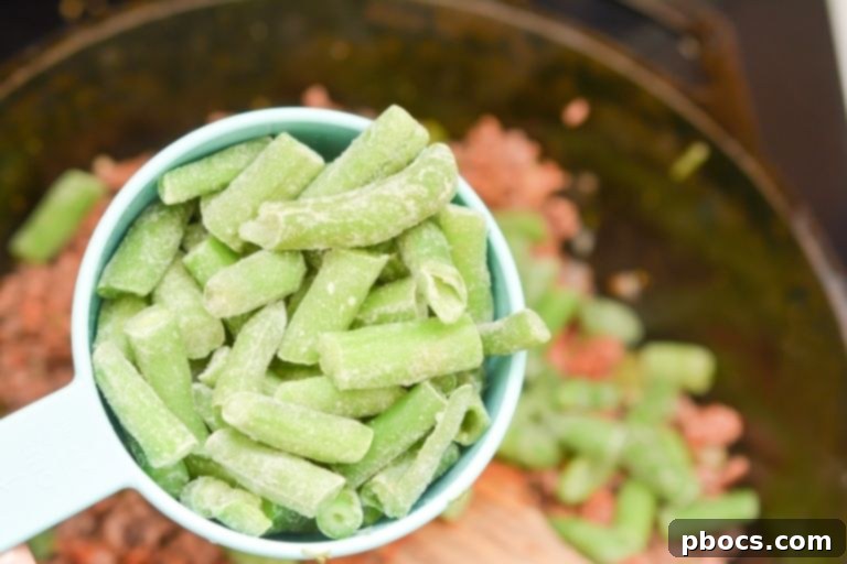 Frozen Green Beans Being Added to the Soup