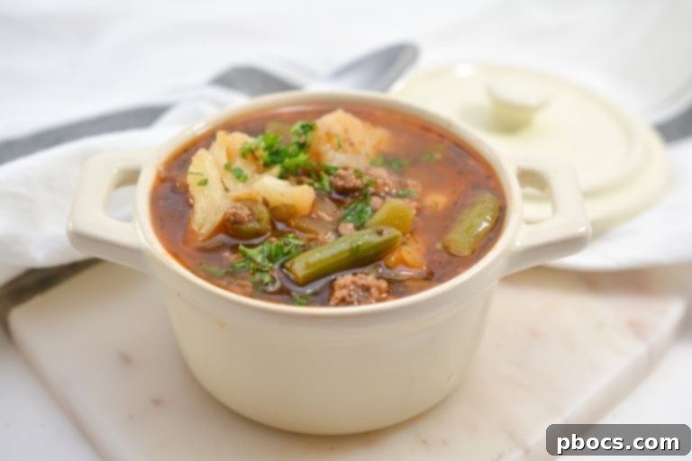 Keto Beef Vegetable Soup in a White Bowl, Ready to Serve