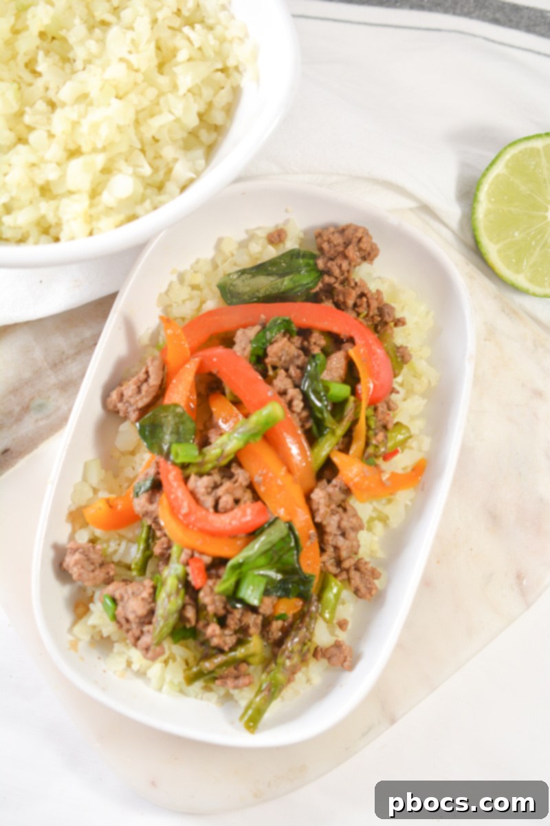 Keto Thai Basil Beef in a meal prep container