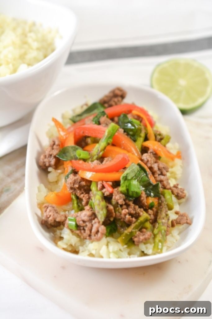 Keto Thai Basil Beef In A White Bowl, ready to serve