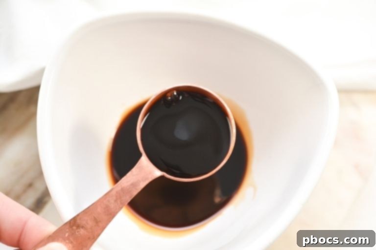 Soy Sauce being poured into a bowl
