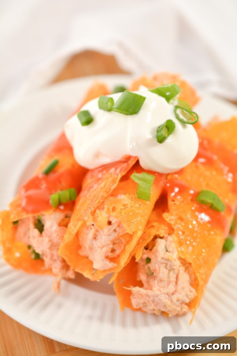 Cheesy Keto Chicken Enchilada Pinwheels 2 Delicious Keto Chicken Enchilada Roll Ups ready to serve