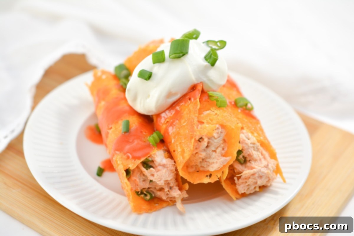 Cheesy Keto Chicken Enchilada Pinwheels 3 Close-up of Keto Chicken Enchilada Roll Ups on a platter