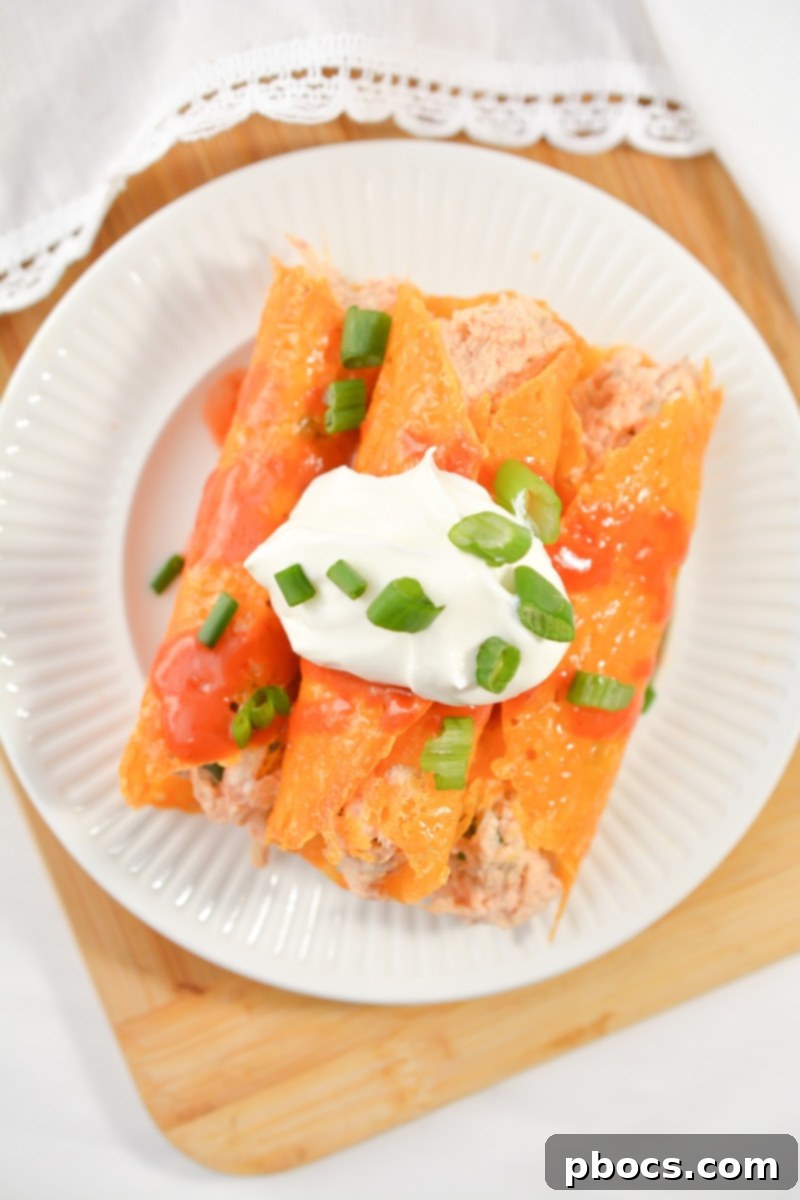 Cheesy Keto Chicken Enchilada Pinwheels 4 Ingredients for Keto Chicken Enchilada Roll Ups laid out