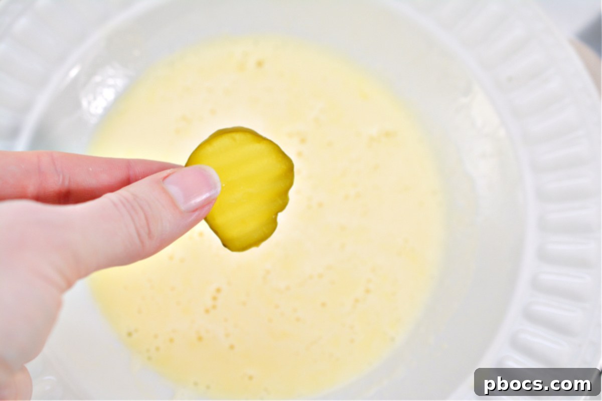 Combining pork rind crumbs and spices