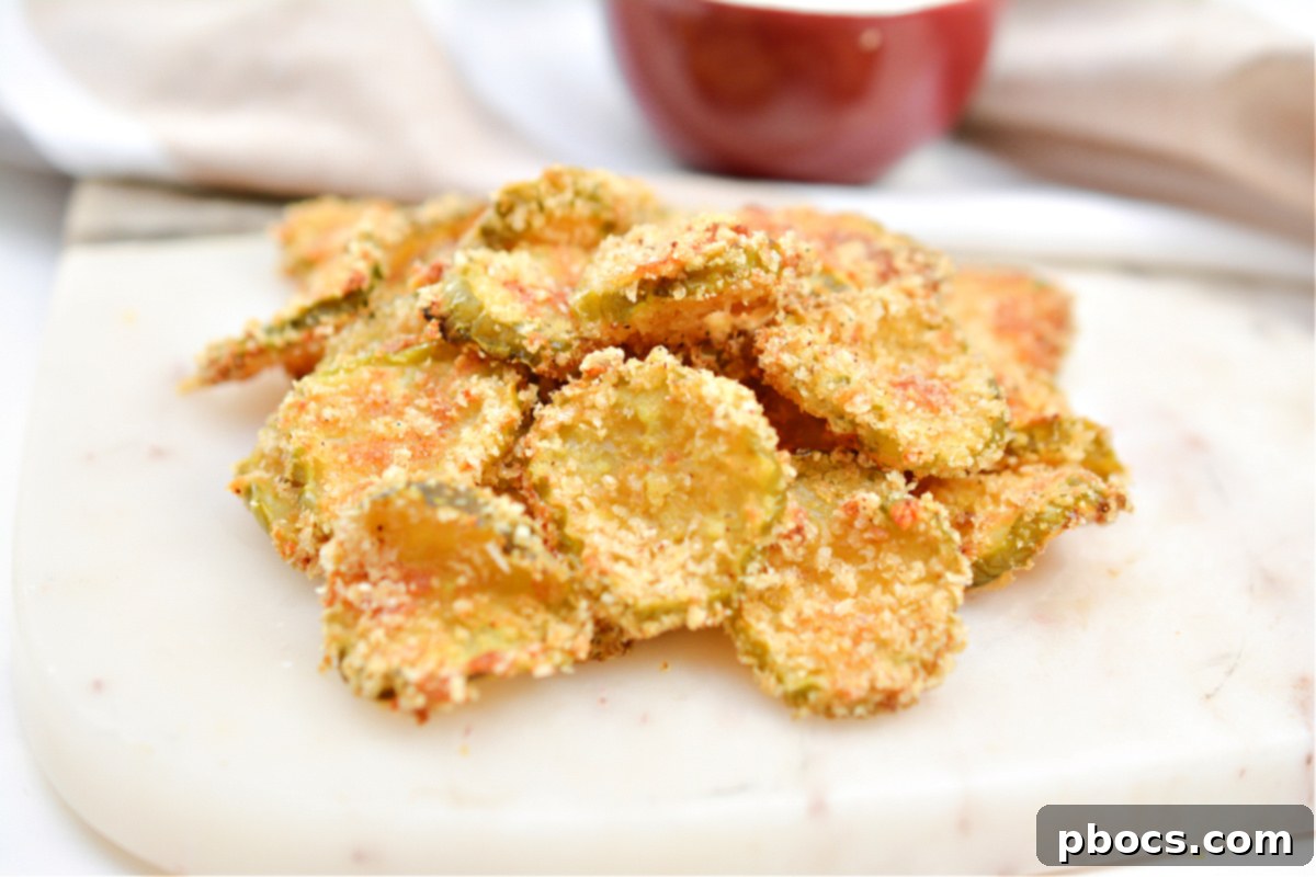 Preparing Air Fryer Pickle Chips with breading