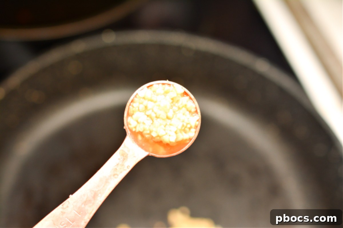 Sizzling Keto Skillet Morning 11 Keto Breakfast Skillet cooking step 3 with garlic