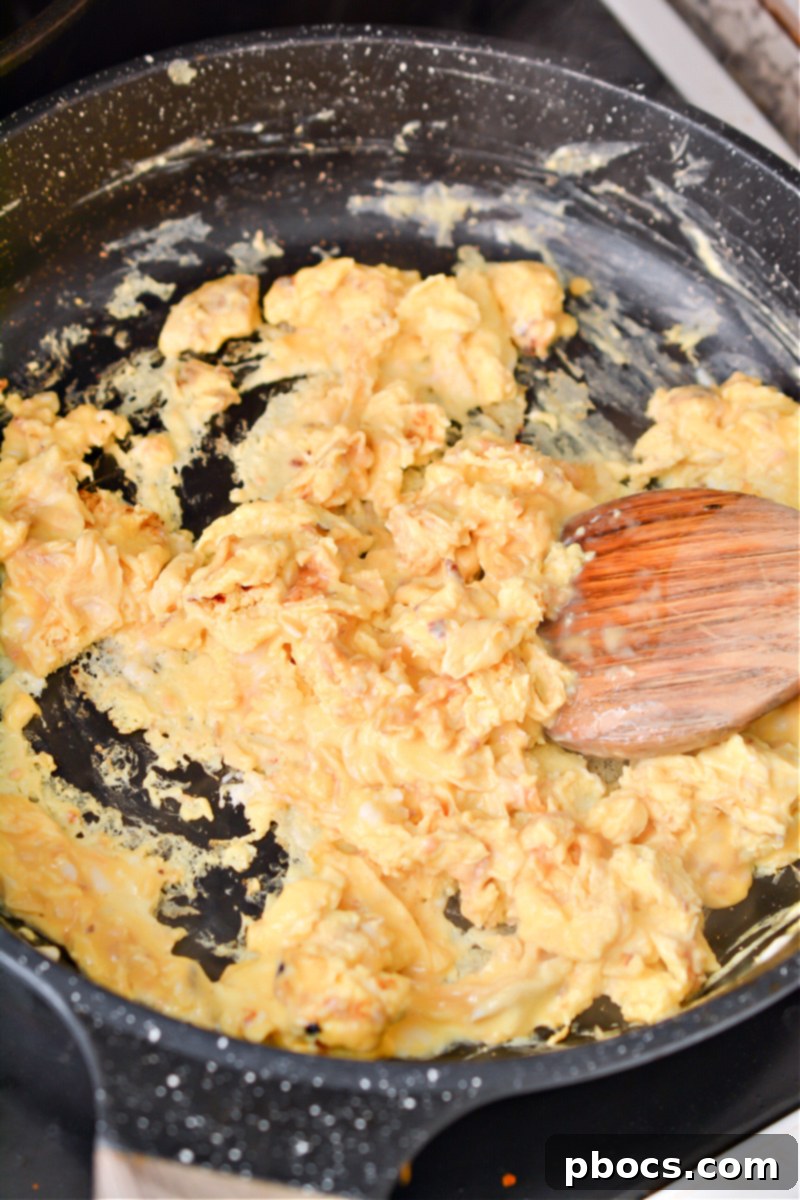 Sizzling Keto Skillet Morning 13 Keto Breakfast Skillet cooking step 5 scrambling eggs