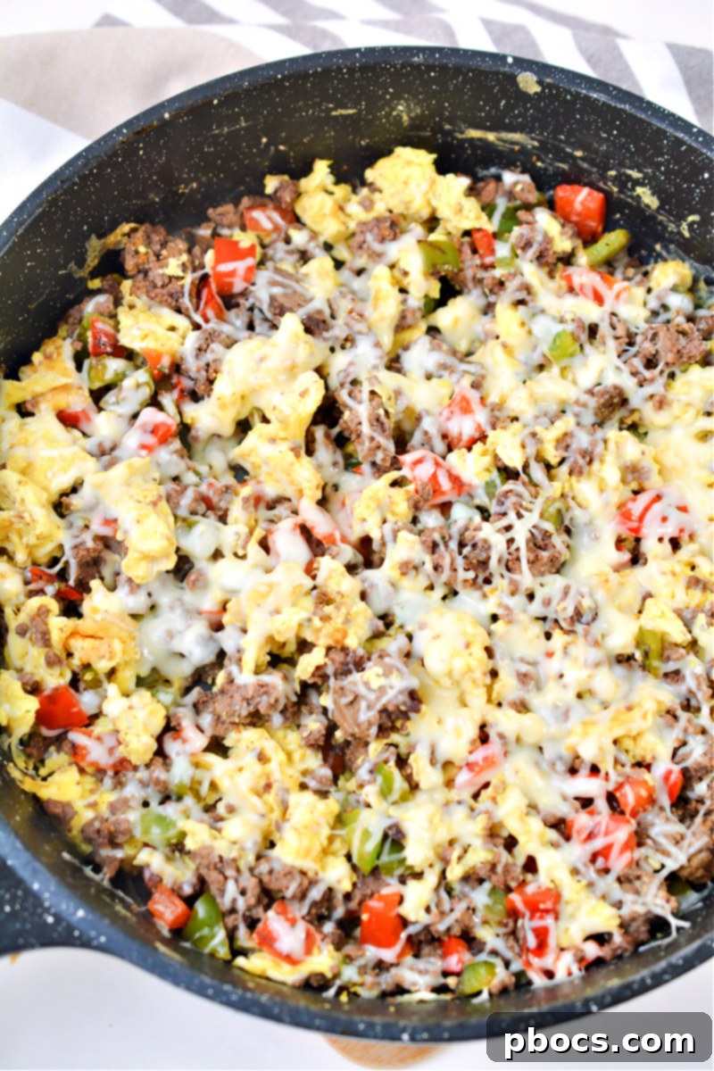 Sizzling Keto Skillet Morning 4 Close-up of Keto Bacon and Egg Casserole with melted cheese