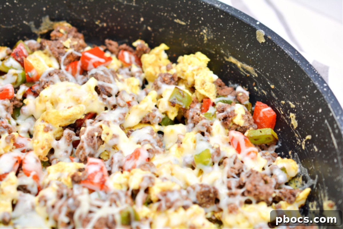 Sizzling Keto Skillet Morning 5 Keto Breakfast Skillet cooking in a pan