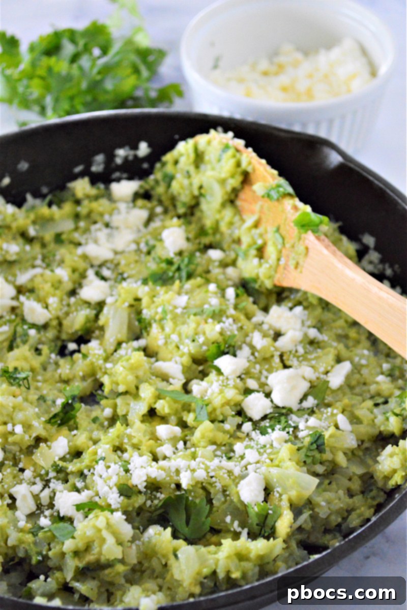 Zesty Cilantro Lime Cauliflower Rice with Creamy Avocado 13 Mixing avocado mash with cauliflower rice