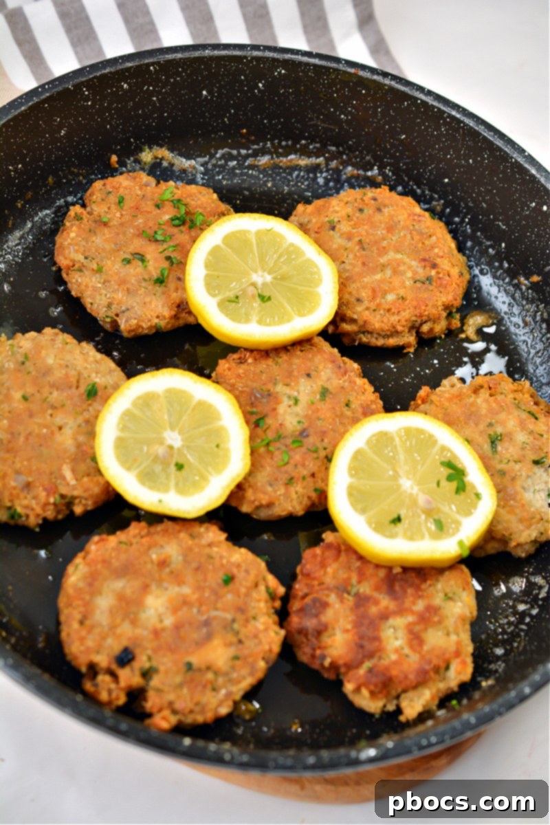 Keto Parmesan Salmon Cakes 12 Cooking Keto Salmon Patties in Skillet
