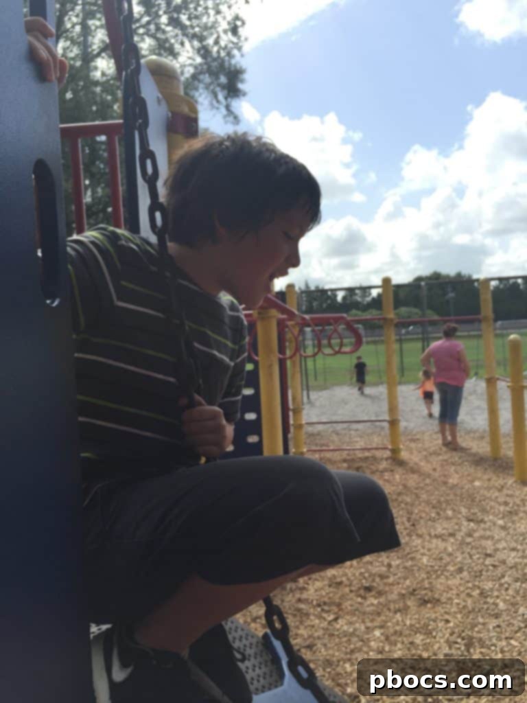 A child joyfully running through the park on a sunny Fourth of July weekend, surrounded by nature.