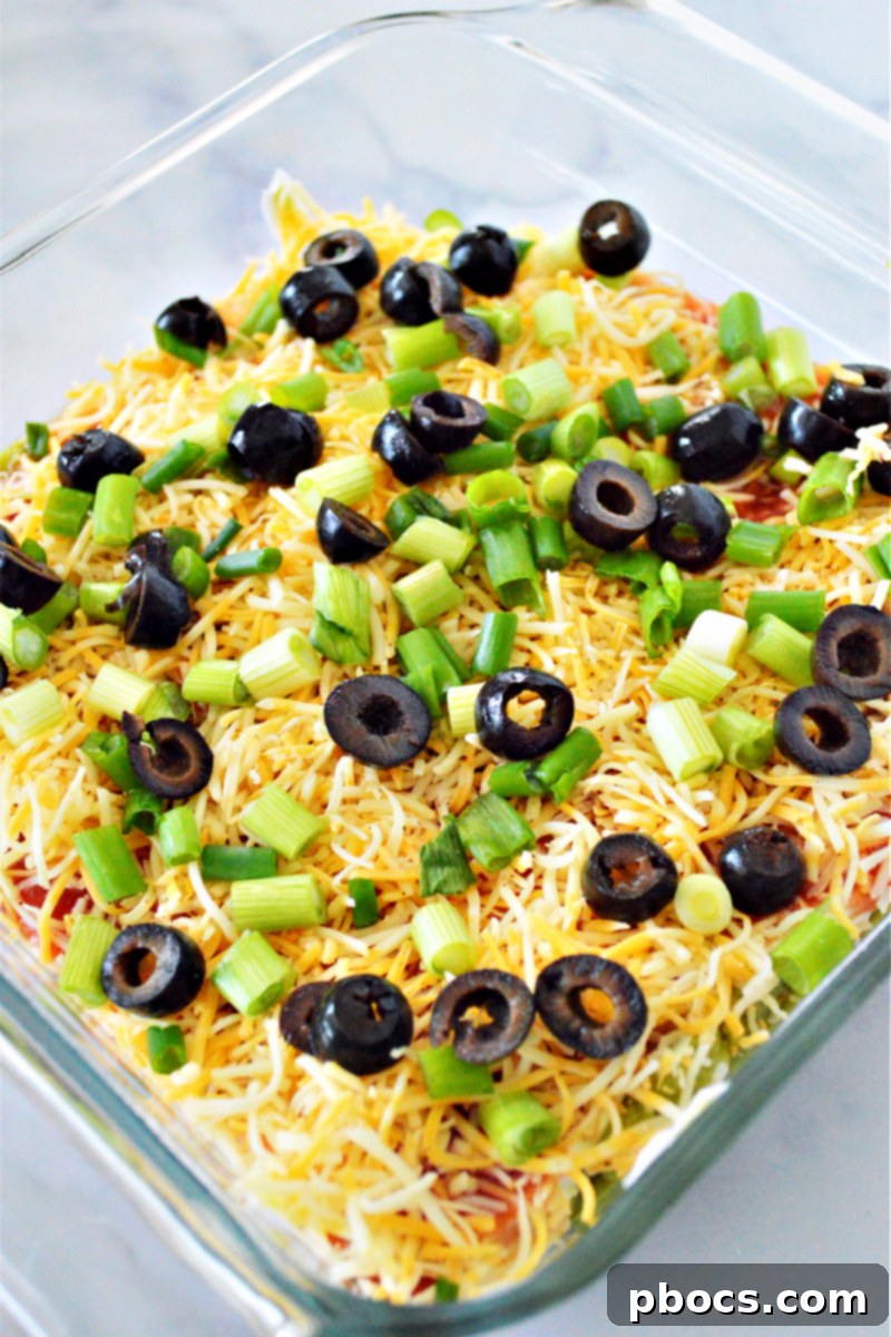 Close-up of the delicious Low-Carb 7 Layer Taco Dip, highlighting the meaty layer.