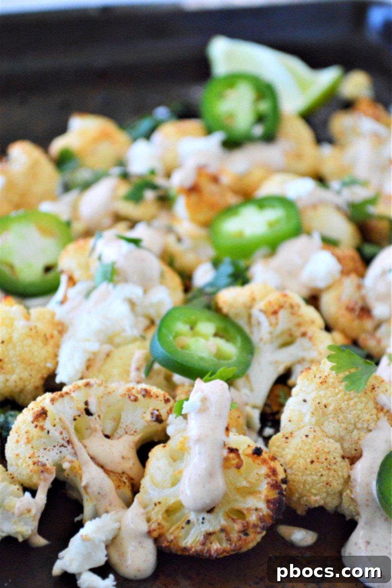 Sliced fresh jalapenos as a garnish on Keto Mexican Street Cauliflower.