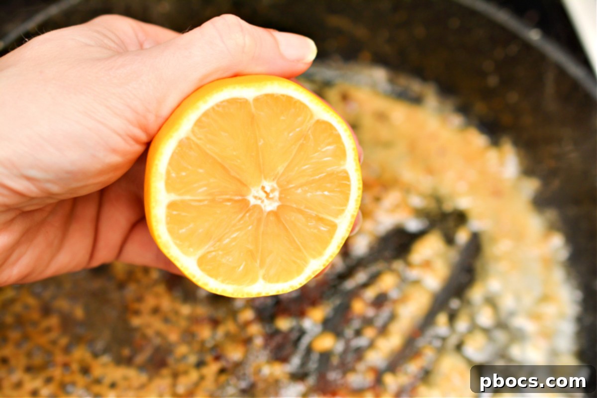 Effortless Keto Shrimp Scampi 13 Whisking in sauce ingredients for Keto Shrimp Scampi