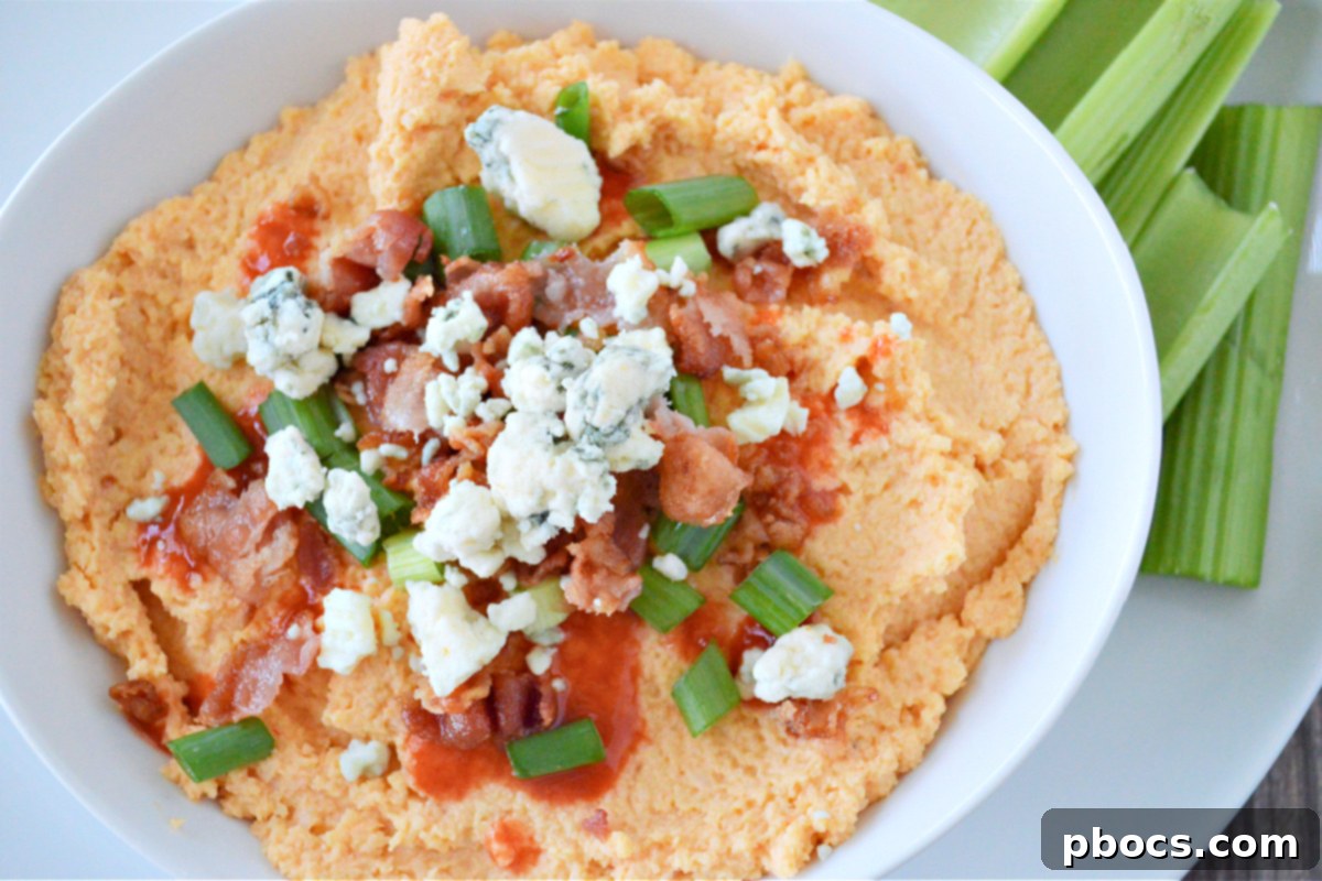 Mixing Buffalo Cauliflower Hummus Ingredients in Food Processor