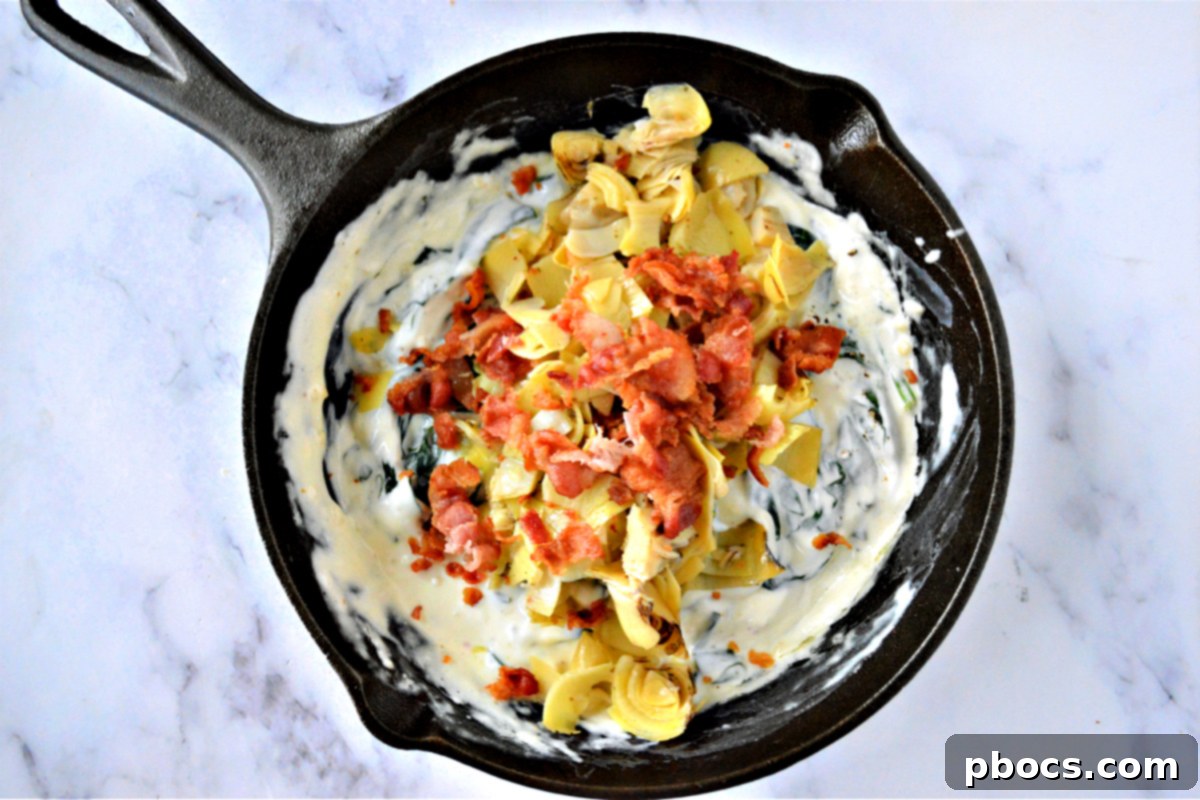 Adding Cheese and Artichoke to Dip