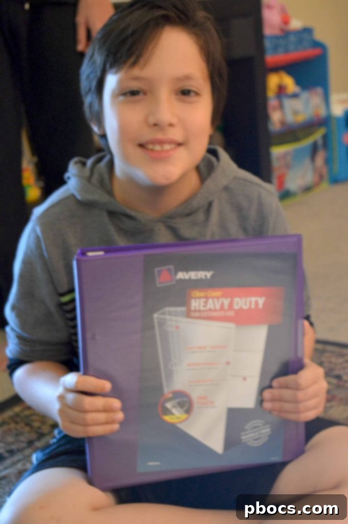 Organized school supplies for back to school featuring colorful Avery binders, dividers, and other classroom essentials