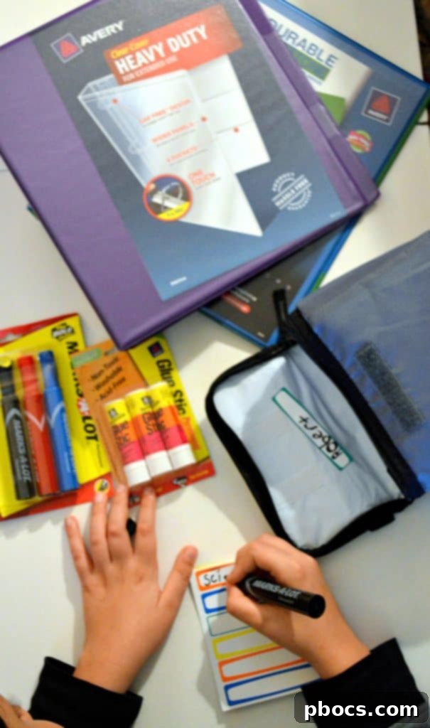 Two children marking off completed tasks on a back-to-school checklist, demonstrating goal setting and incentives