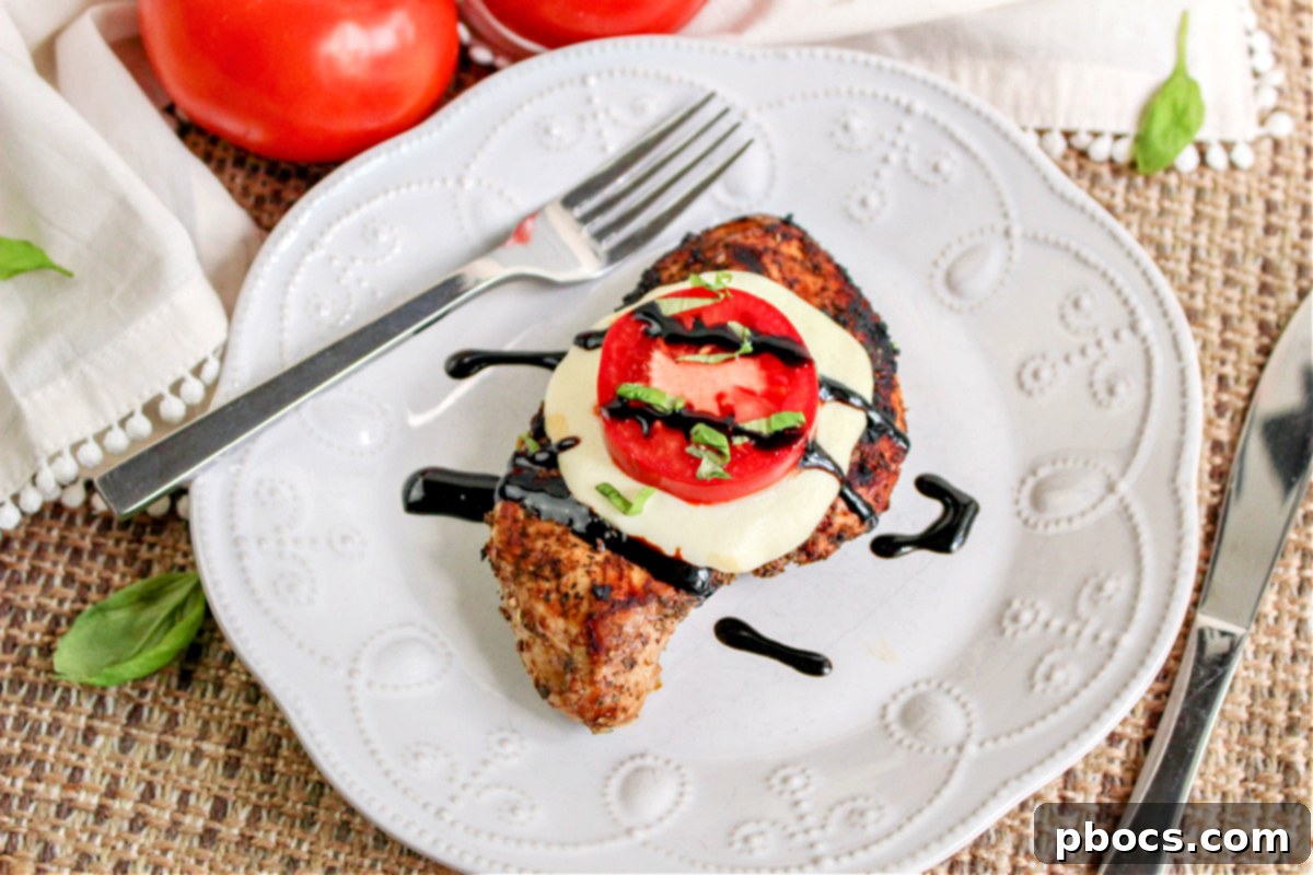 Keto Caprese Chicken Bake 5 A close up of freshly grilled Caprese chicken breasts