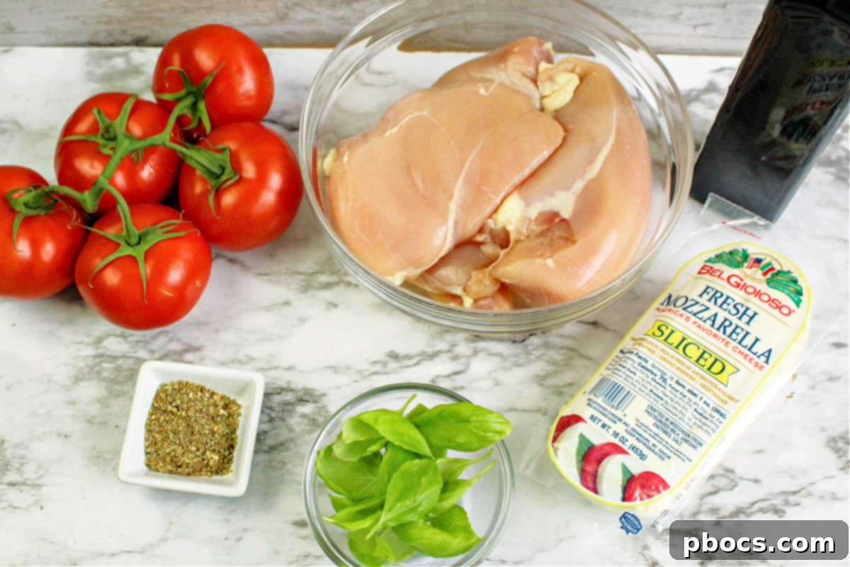 Keto Caprese Chicken Bake 6 Uncooked Caprese chicken with ingredients laid out