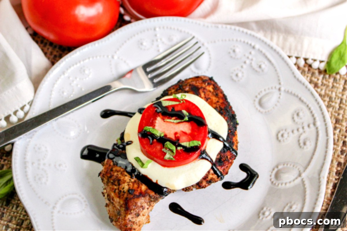 Keto Caprese Chicken Bake 9 Chicken breasts being seasoned for Caprese chicken