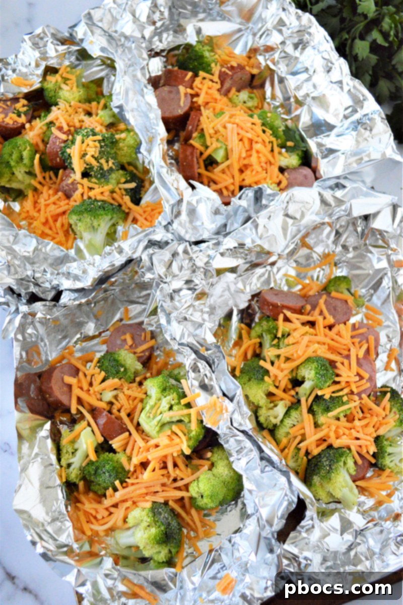 Flavorful Sausage Broccoli Foil Meals 13 Dividing Sausage and Broccoli into Foil Boats