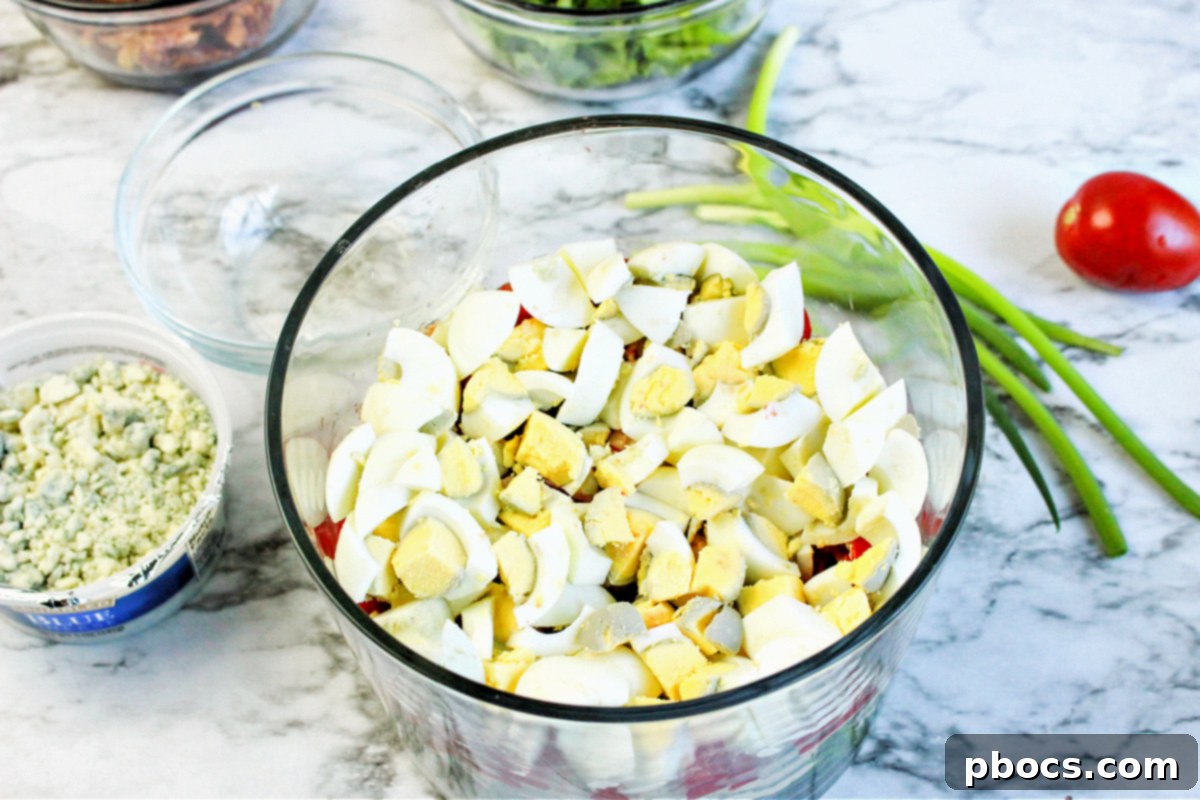 Smart Carb Chicken Cobb Trifle 14 Adding hard-boiled eggs and dressing layers