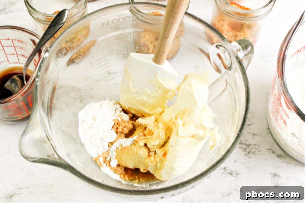 Folding whipped cream into mascarpone mixture