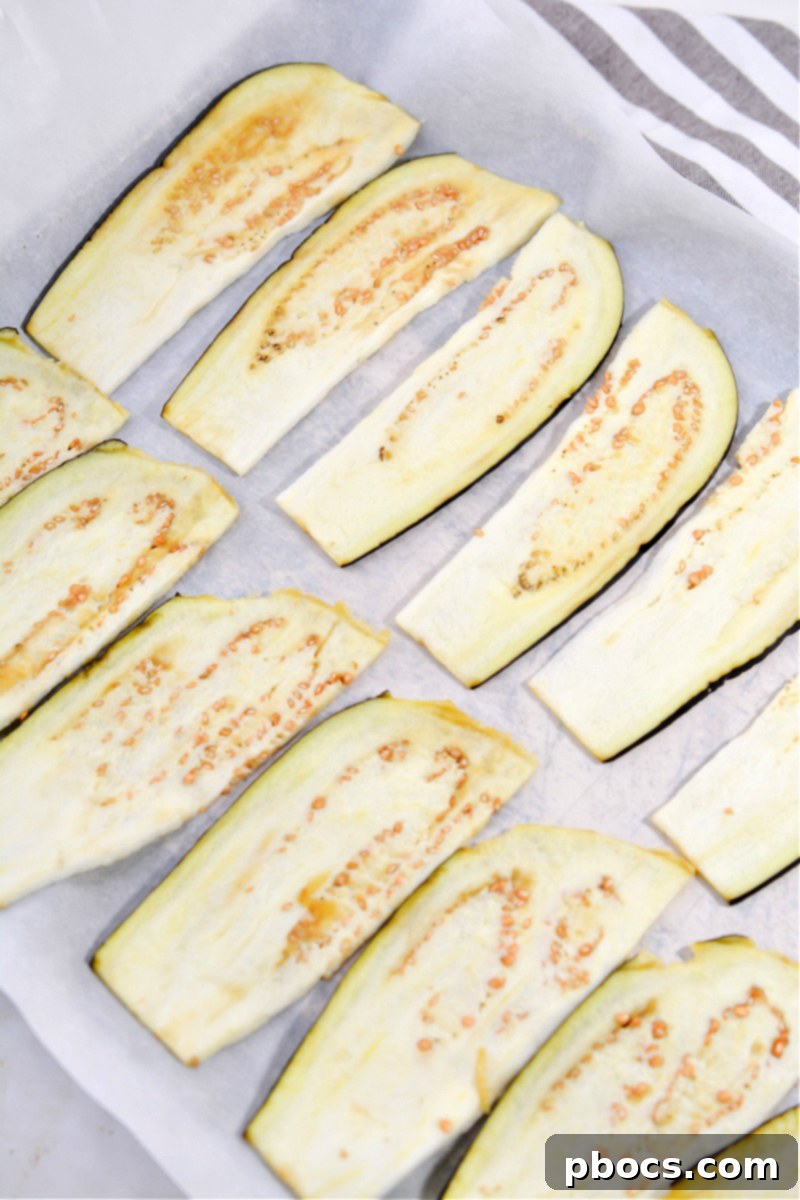 Eggplant slices on baking sheet