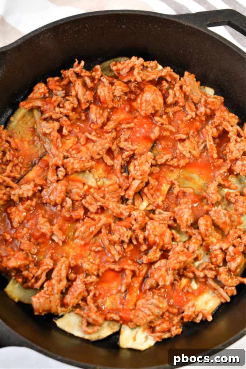 Meat layer over eggplant