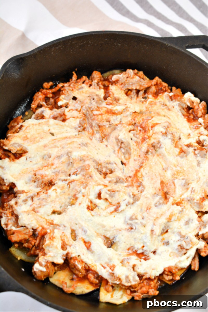 Ricotta layer over meat