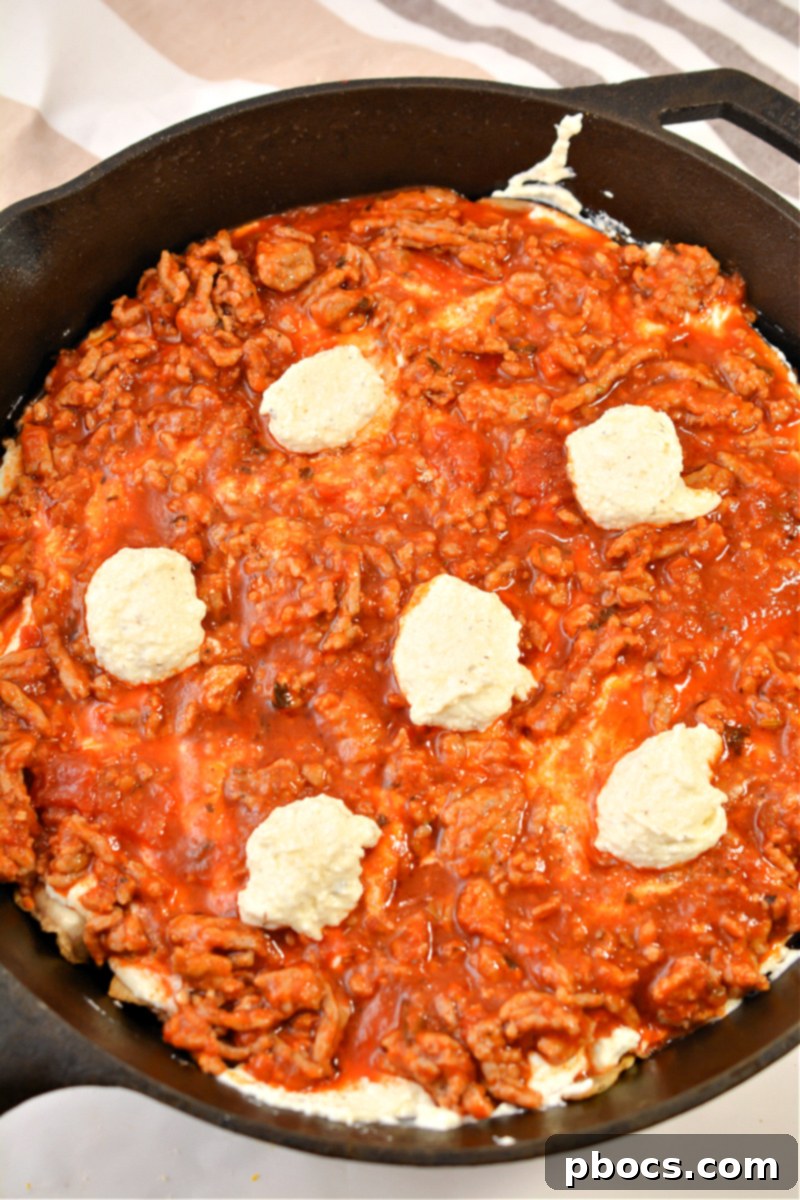 Dollops of ricotta on top