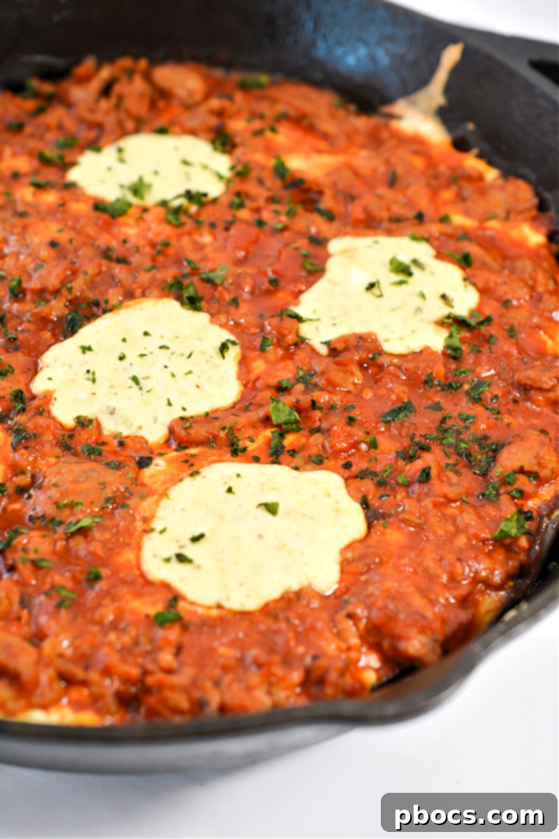 Cooking ground sausage for Keto Eggplant Lasagna