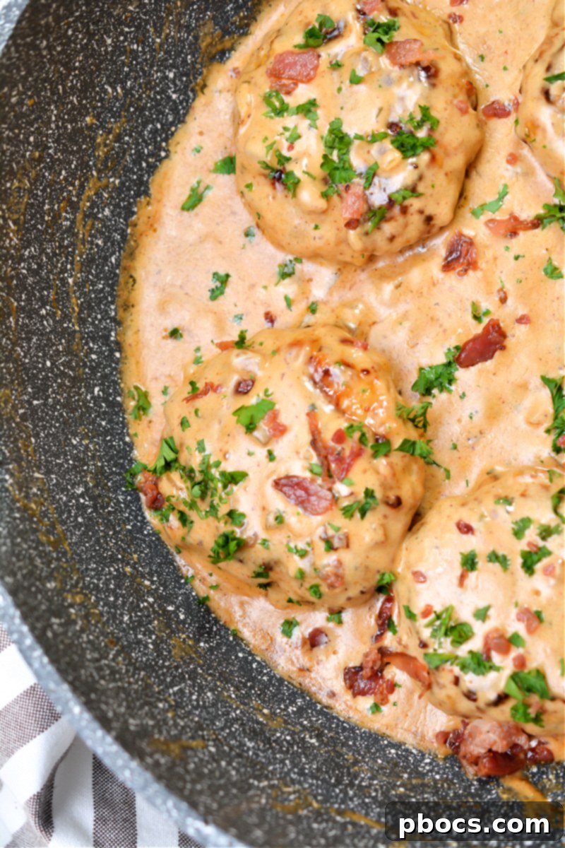 Delicious Keto Cheddar Ranch Chicken Burgers with BBQ Cream Sauce, served with sides