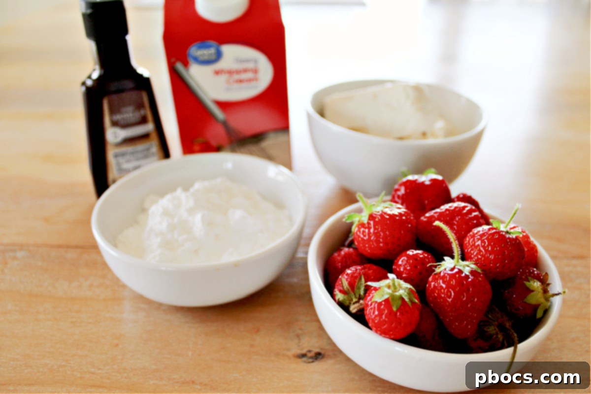 Close-up of Keto Strawberry Cheesecake Popsicle layers - Pink strawberry and white cheesecake