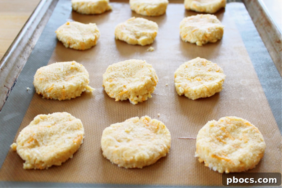 Keto biscuits on a baking sheet before baking