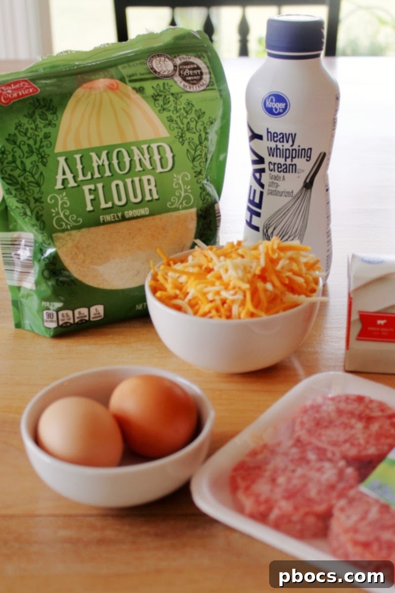 Single Keto Sausage Breakfast Sandwich sliced in half, showing filling