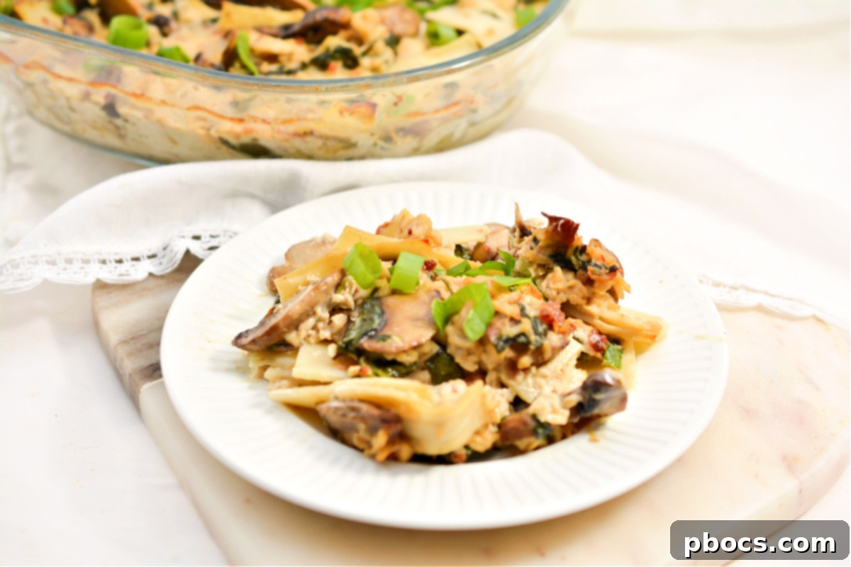 Comforting Keto Tuna Bake 11 A full baking dish of golden-brown Keto Tuna Noodle Casserole, showcasing a complete, budget-friendly meal.