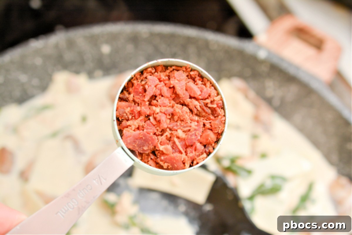 Comforting Keto Tuna Bake 23 The fully mixed keto tuna noodle casserole mixture in the skillet, ready for baking.